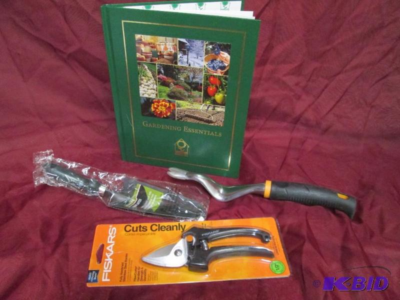 lot 6 image: Gardening Essentials hard cover book with gar...