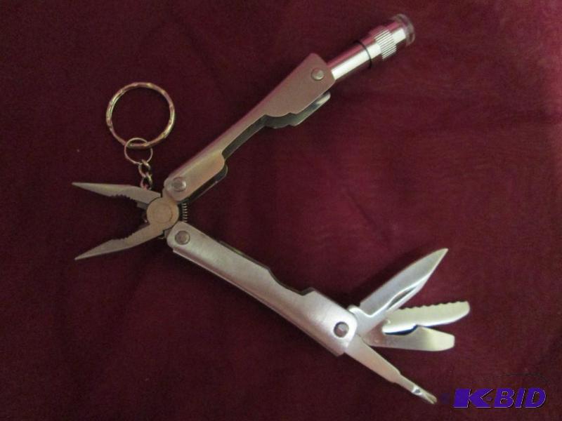 lot 70 image: Multi purpose tool. Plier with two different ...