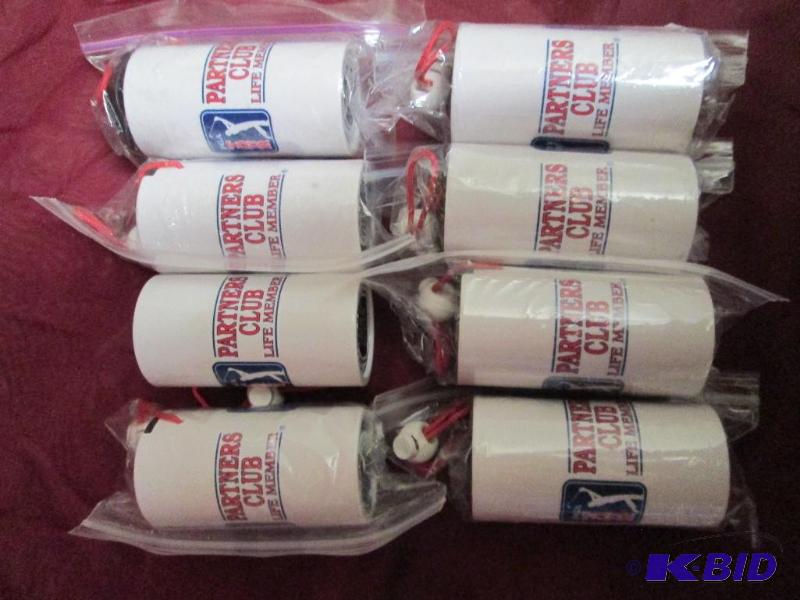 lot 82 image: Lot of 8 tee shakers with nylon hangers. Perf...