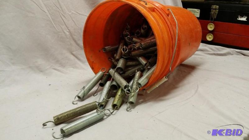 lot 13 image: Bucket full of springs, about 50 lbs.worth. T...