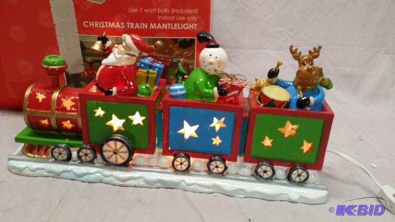 lot 86 image: Christmas train mantle light. Made of ceramic...