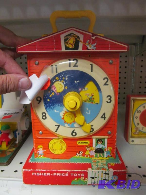 lot 22 image: 1968 Fisher Price Music Box Teaching Clock