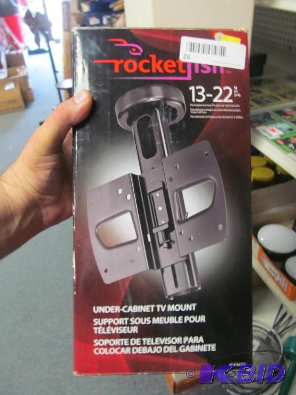 lot 92 image: Under Cabinet TV Mount & Battery Charger