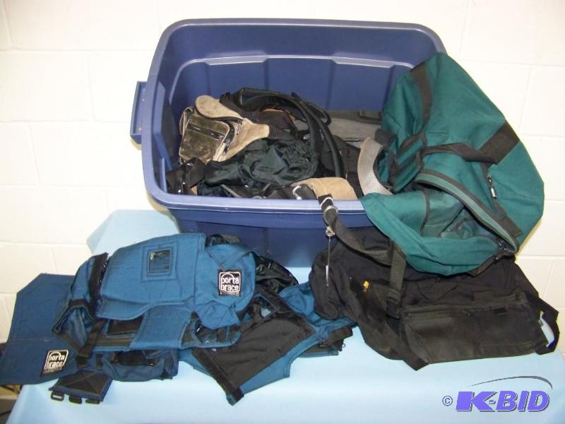 lot 123 image: Plastic Tote filled with miscellaneous Bags and Shoulder Straps