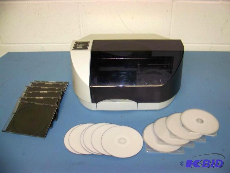 lot 29 image: Primera, Bravo SE, Auto Printer  Disc Publisher  DVD Duplicator with Blank Discs and Jewel Cases