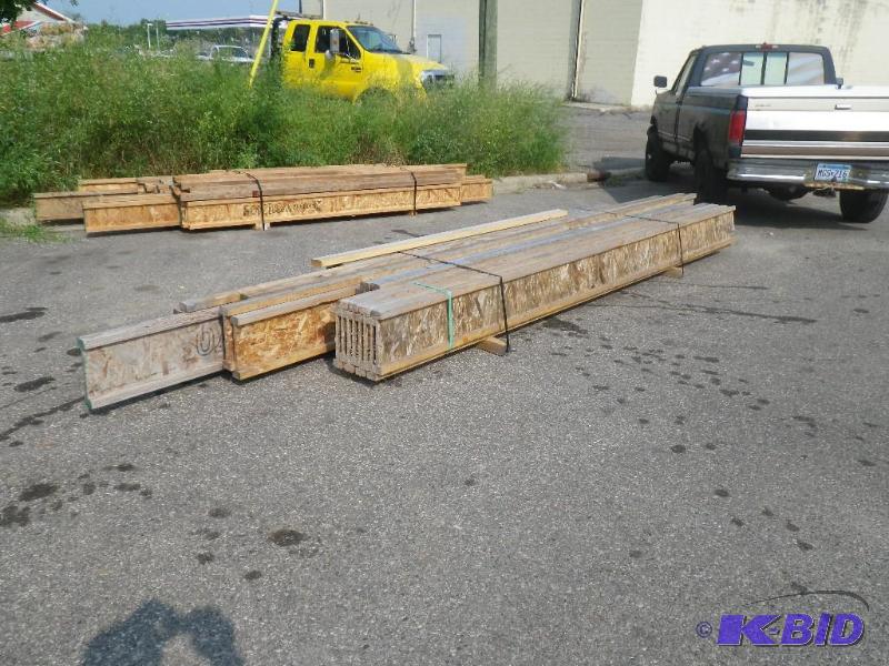lot 13 image: Pile of new wood I trusses, approx 23 12"...