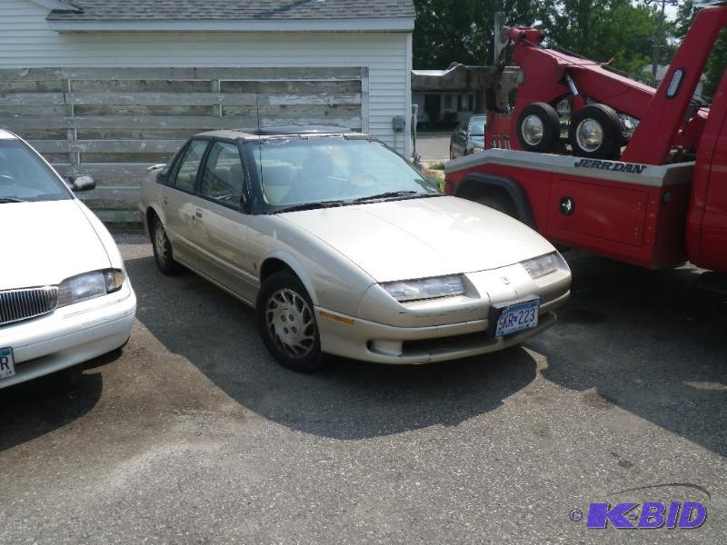 lot 8 image: Year 1994 Make Saturn Model S Series Vehic...