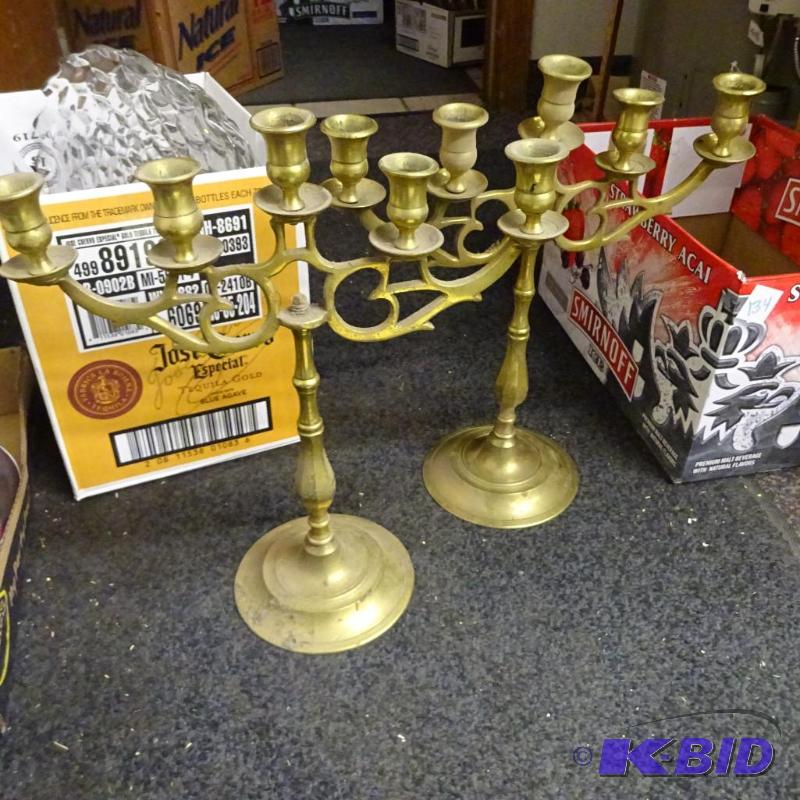 lot 134 image: 2 brass candle holders...