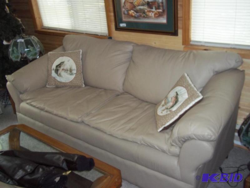 leather sofa with pillows, no rips or tears (matches 27)