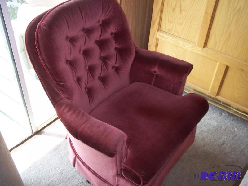 Red swival rocker chair
