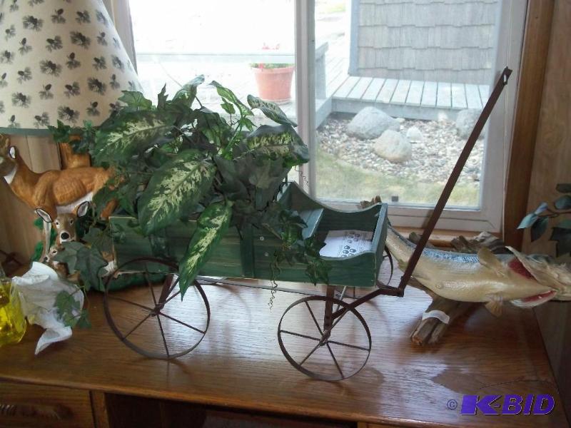 metal frame wagon with plant