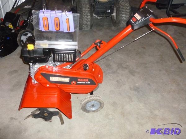 lot 1 image: Craftsman front tine tiller. 24" width. ...