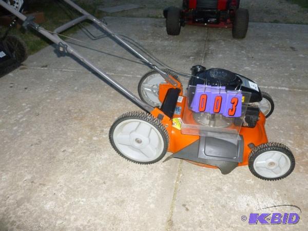 lot 3 image: Husquvarna 21" push mower. Appears in ve...