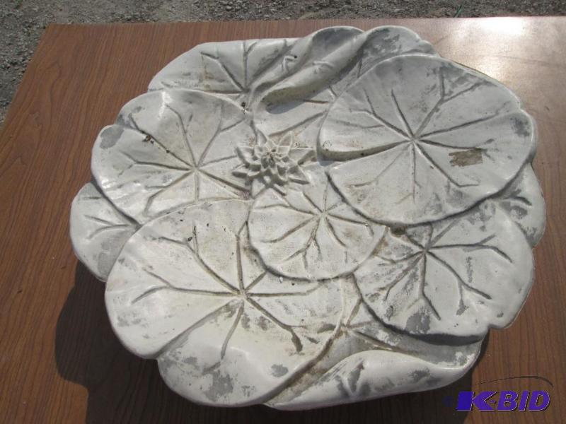 lot 11 image: Plastic top for a bird bath, approx. 18 inche...