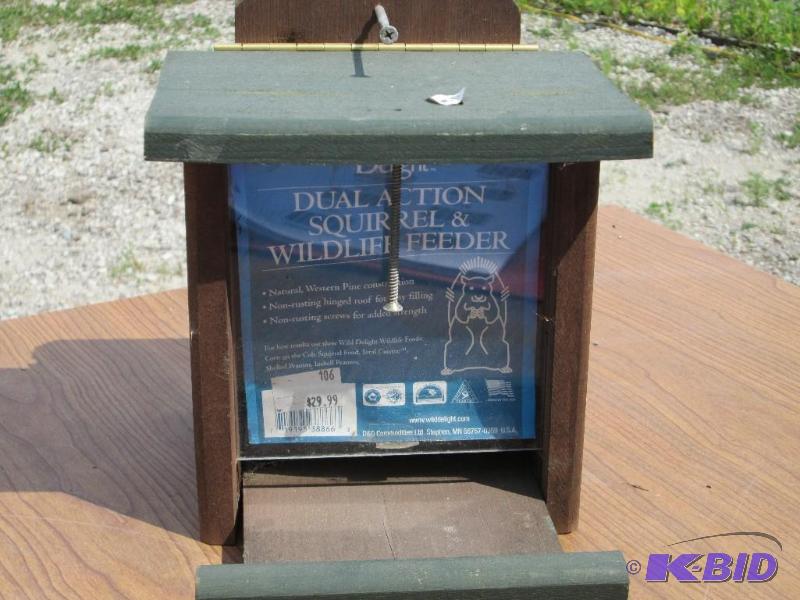 lot 121 image: Dual action squirrel and wildlife feeder, woo...
