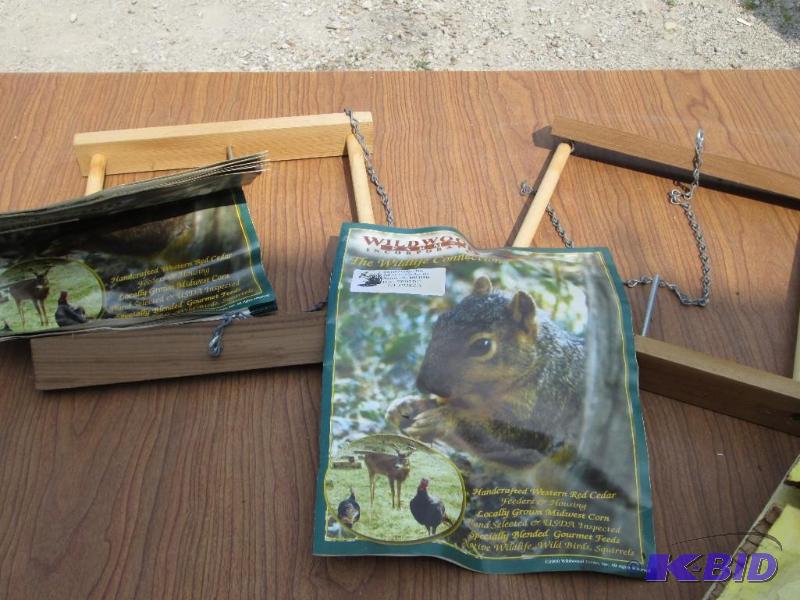 lot 135 image: Lot of 2 flying trapeeze squirrel feeders...
