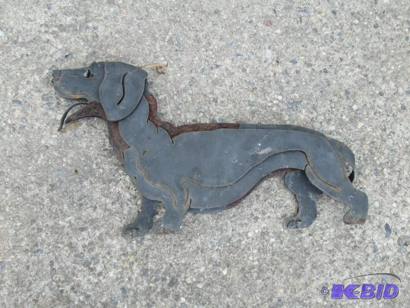 lot 137 image: Metal dog, has places on paw to stake down, 1...