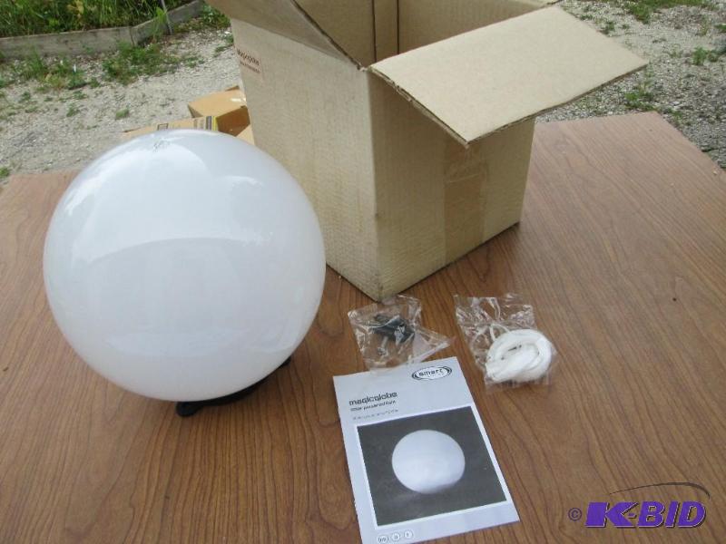 lot 177 image: Magic globe solar powered light, stores solar...