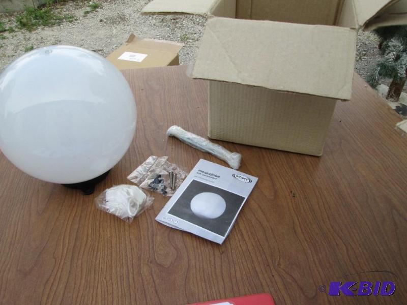 lot 180 image: Magic globe solar powered light, stores solar...