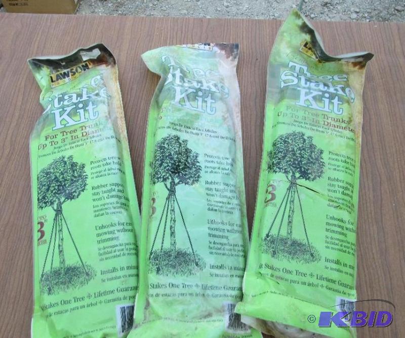 lot 193 image: lot of 3 tree stake kits, rubber supports, un...