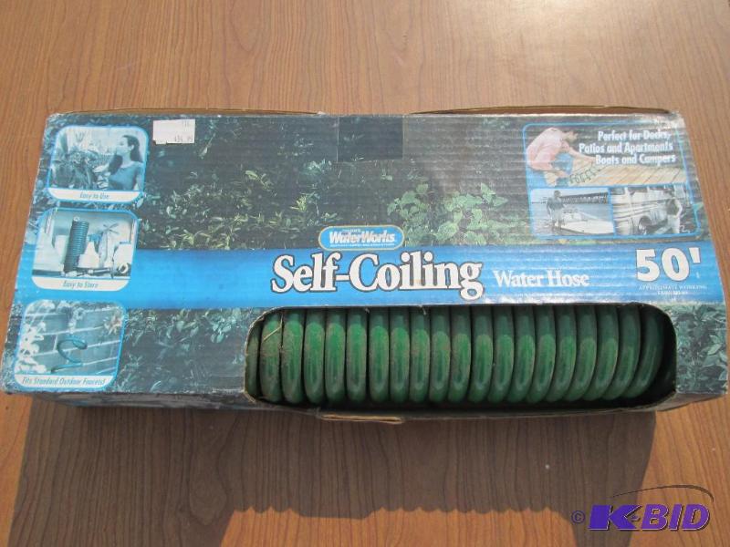 lot 2 image: Water Works 50 foot self coiling garden hose,...