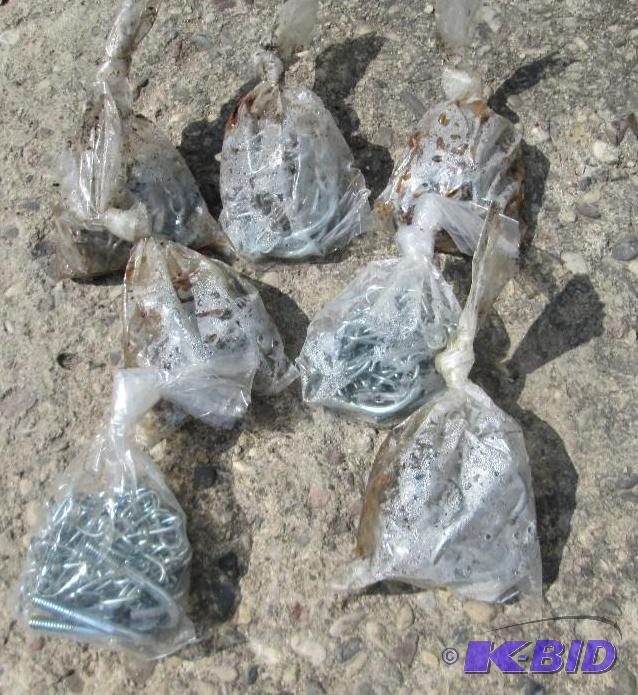 lot 252 image: Lot of 7 chains, U clamps and bolts to hang b...