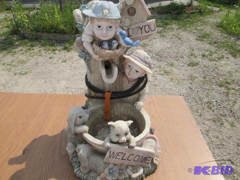 lot 39 image: Cast garden ornament, features I love you wit...
