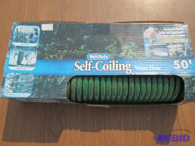 lot 4 image: Water Works 50 foot self coiling garden hose,...