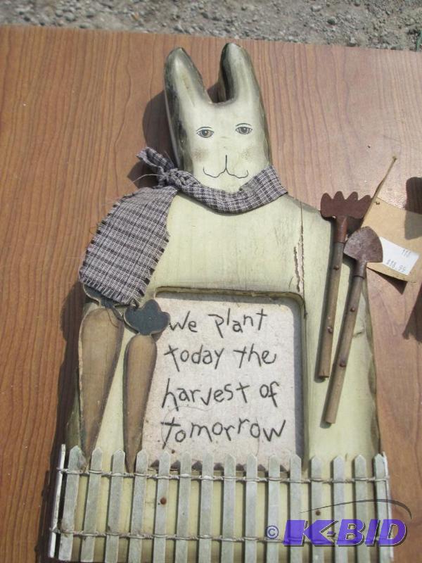 lot 41 image: Rabbit yard ornament with decorative trim, by...