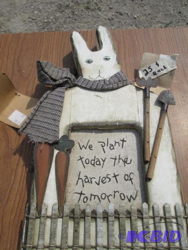 lot 42 image: Rabbit yard ornament with decorative trim, by...