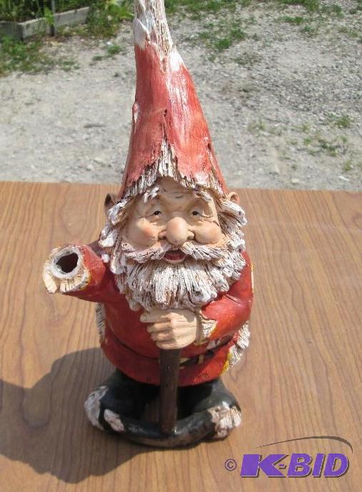 lot 55 image: Garden gnome, has hand open to hold cut real ...
