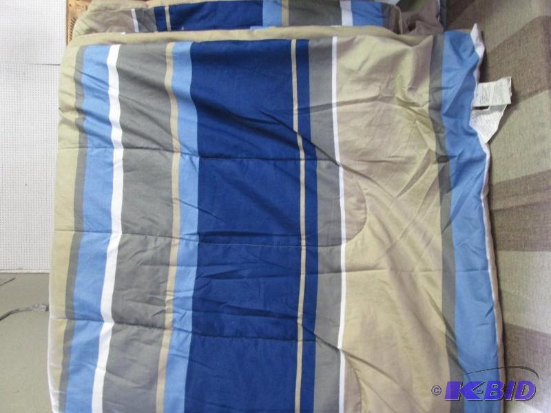 reversible blue and tan twin size comforter...