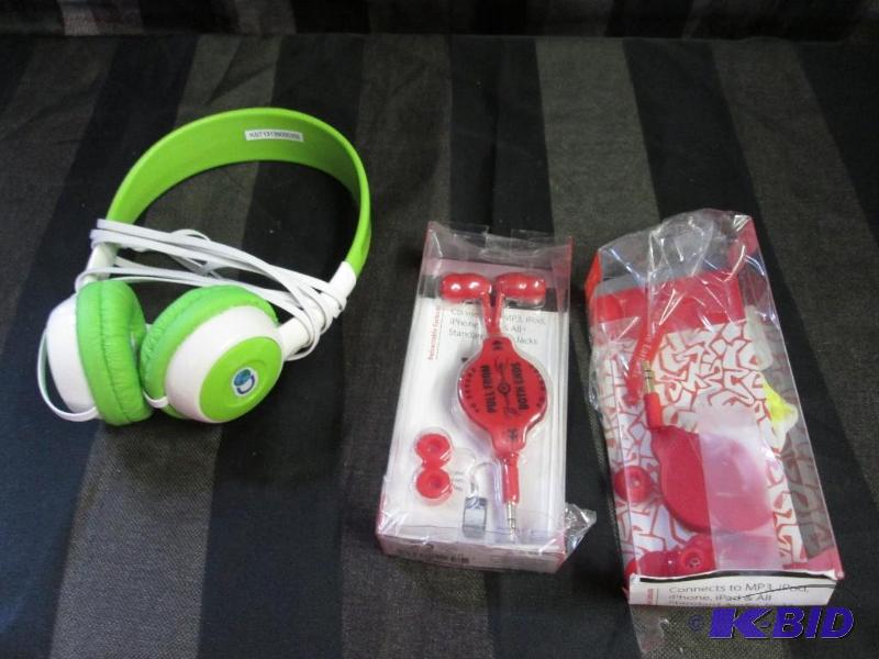 group of 3 headphones 2 red 1 green and white...