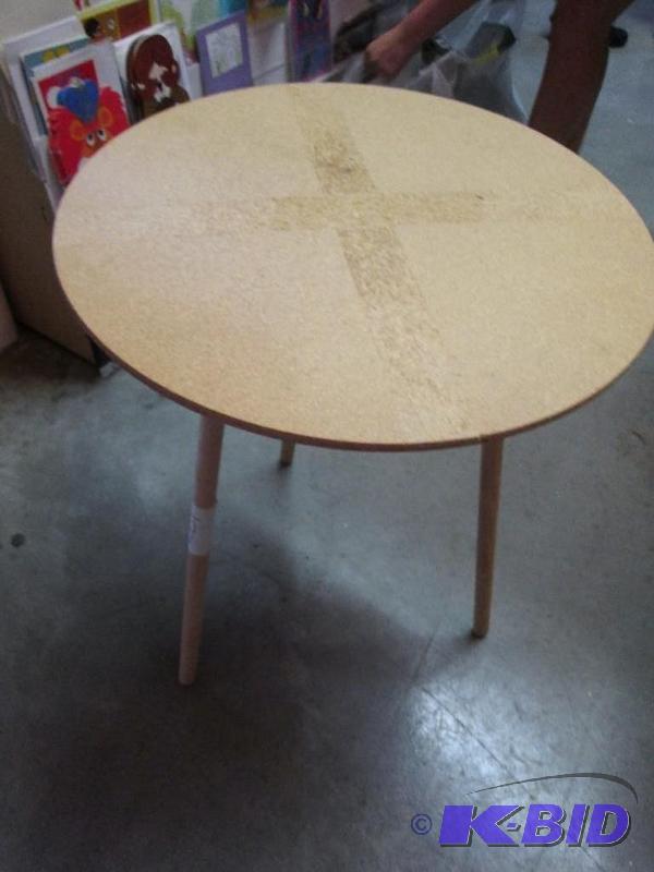 three legged small circle table...