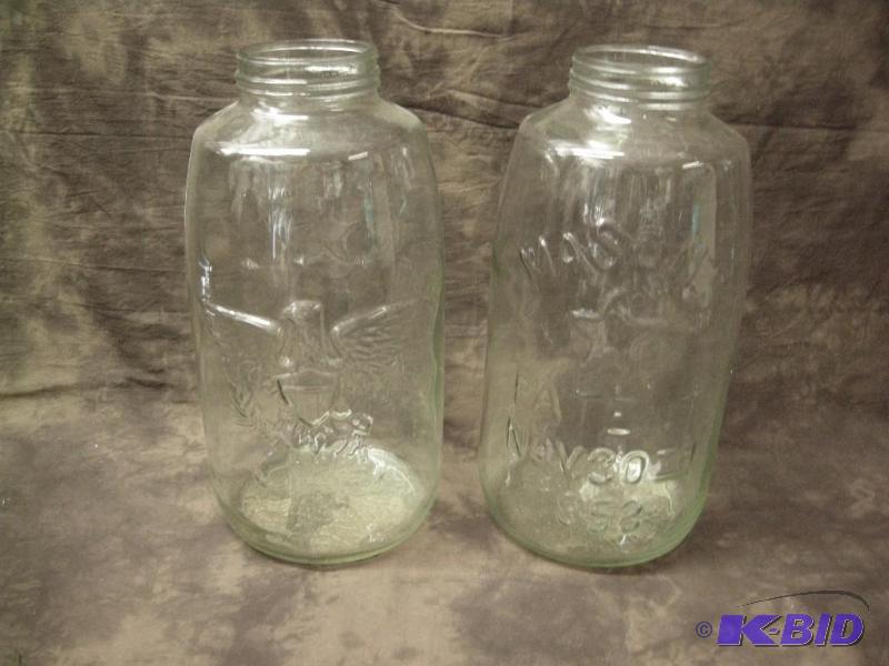 lot 107 image: 2 large Masons clear canning jars