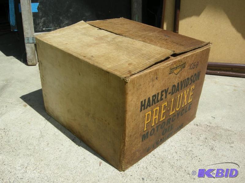 lot 11 image: Vintage Harley Davidson case of 6 1-gallon Pre-Luxe Premium oil