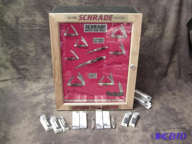 lot 112 image: Amazing Schrade OldTimer Store Display with 21 pocket knives