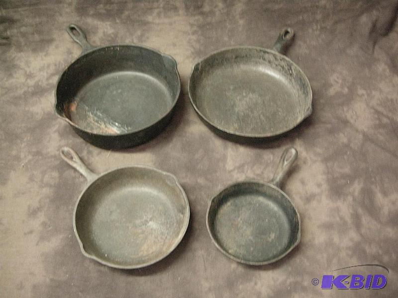 lot 114 image: Group cast iron pans
