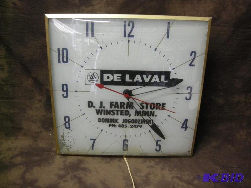 lot 159 image: Vintage De Laval advertiser implement dealer clock