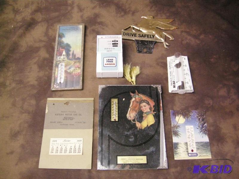 lot 201 image: Vintage automotiveoil advertiser items