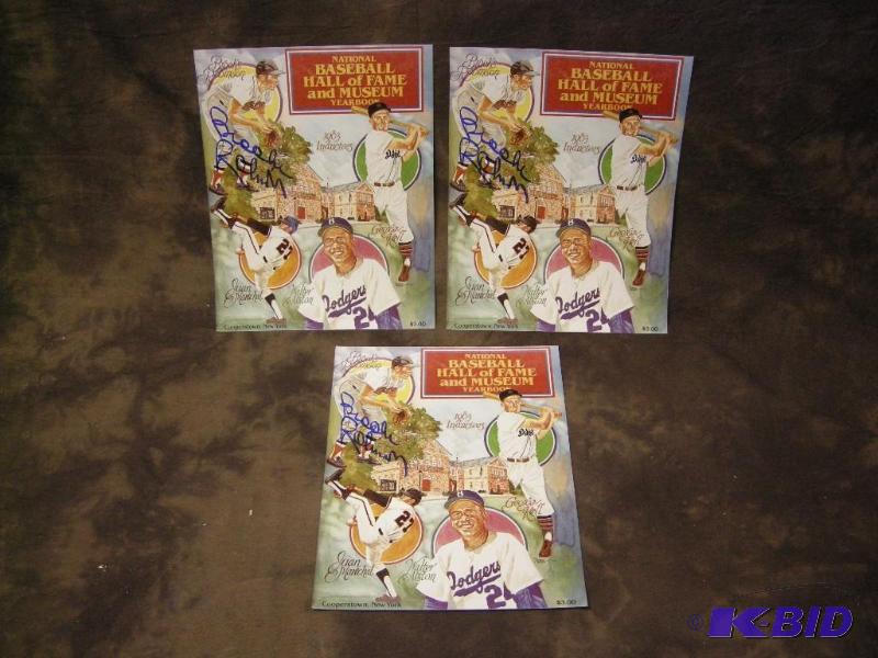 lot 206 image: 3 Brooks Robinson autographed National Baseball Hall of Fame and Museum Yearbook cards