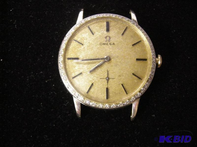 lot 26 image: Vintage Omega 18k watch