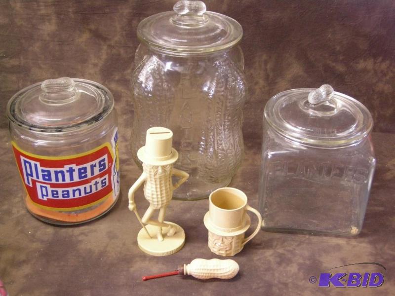 lot 366 image: Planters Peanuts glass jars with lids and character cup, bank, other