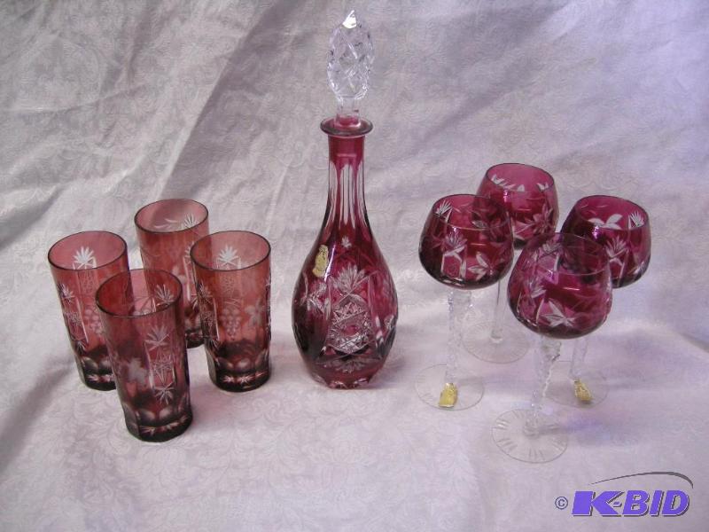 lot 367 image: Imperlux West Germany red cut-to-clear crystal decanter, 4 wine glasses, and 4 water glasses