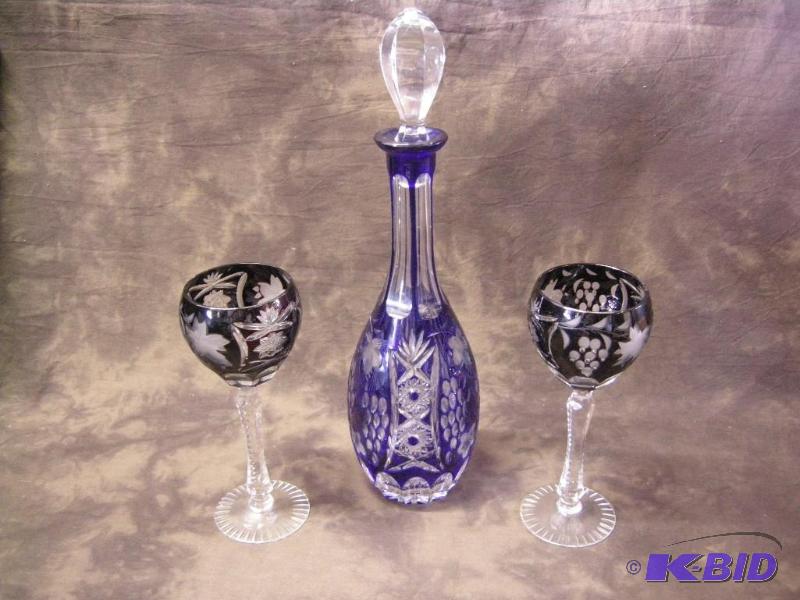 lot 376 image: Blue cut-to-clear decanter with stopper and 2 rare black cut-to-clear glasses