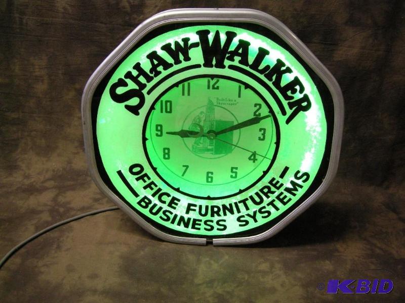 lot 394 image: Antique rare 1930s Shaw-Walker reverse painted electric green neon clock sign