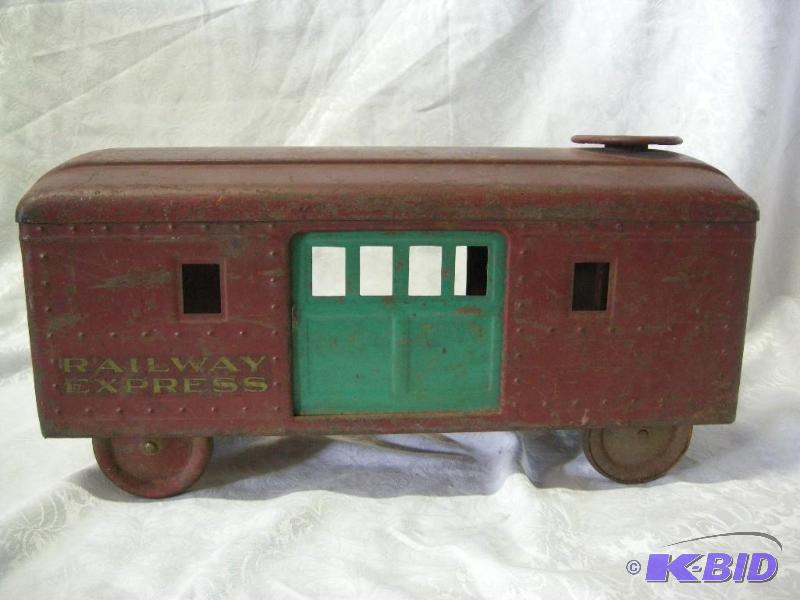 lot 420 image: 1920s Railway Express Buddy L Ride On Train car