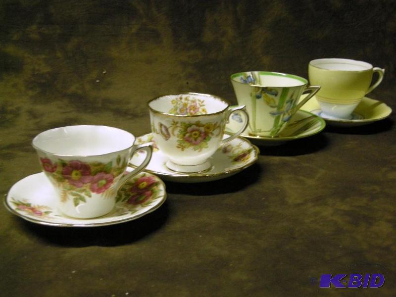 lot 457 image: 4 cup and saucer sets