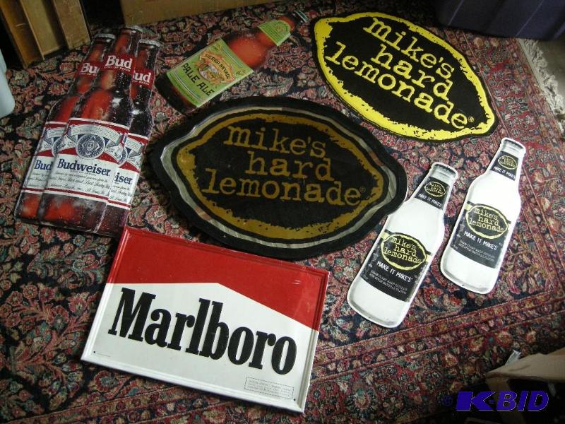 lot 473 image: Group advertiser tin signs and mirror