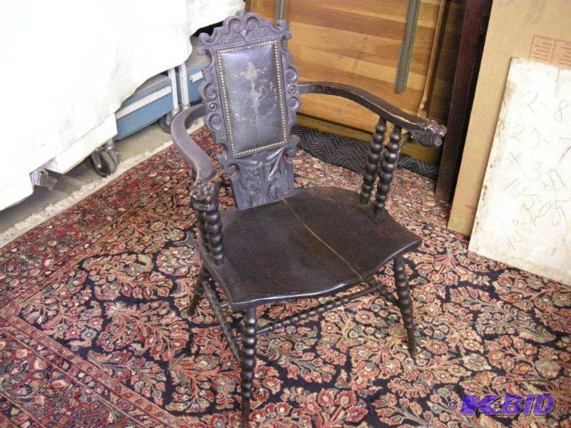 lot 528 image: Early ornately carved chair